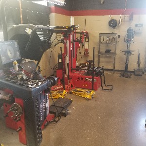 Various pieces of equipment in the student auto shop.